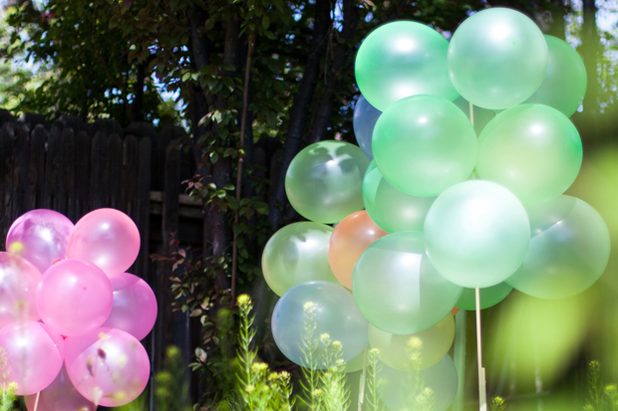 Ballons aren't just for kids' parties-- in one color and grouped together, they add a festive air to any soiré-e.
