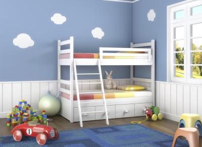 Enfant's bedroom with large furniture against wall.