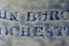 Fabricant's mark of Rochester, New York, potter John Burger